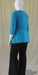 back view of turquoise 3/4 sleeve wrap top