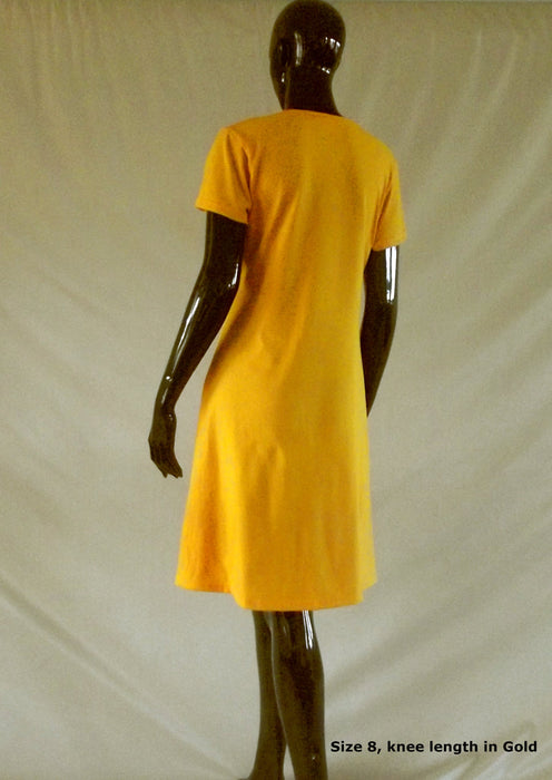 back view of women's yellow knee length cotton dress