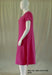 side view of hot pink women's cotton mid calf length dress