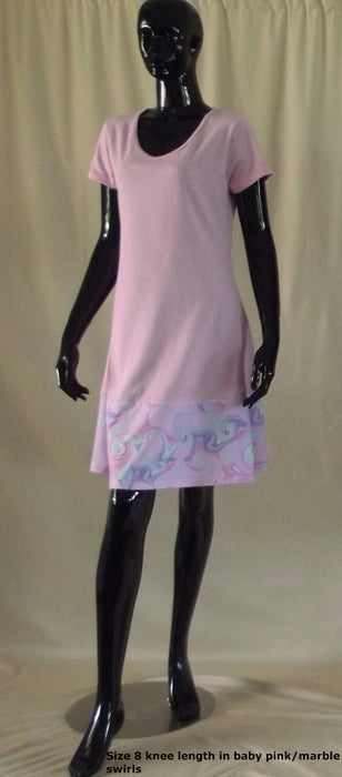 baby pink short sleeve women's cotton dress with pink and purple marble swirl hem detail