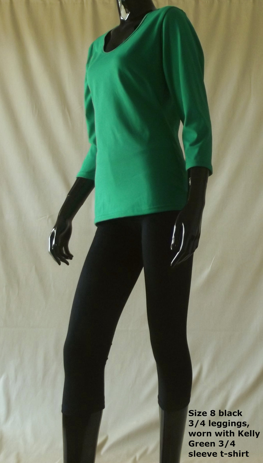 black 3/4 length women's leggings with kelly green women's cotton 3/4 sleeve top